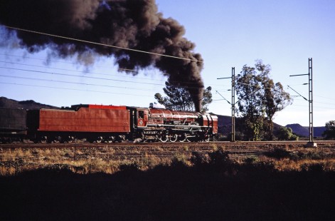 South African Railway 4-8-4 steam locomotive no. 3417 moves along the track in Three Sisters, Western Cape, South Africa, on April 1, 1995. Photograph by Fred M. Springer, © 2014, Center for Railroad Photography and Art. Springer-So.Africa-NOR-SWE-05-15