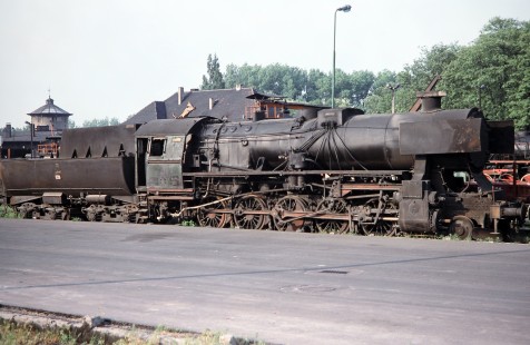 Polskie Koleje Państwowe (Polish State Railways) steam locomotive no. 220 sits stationary by Wolsztyn Station in Wolsztyn, Greater Poland, Poland, on May 20, 1993. Photograph by Fred M. Springer, © 2014, Center for Railroad Photography and Art. Springer-Europe-01-15