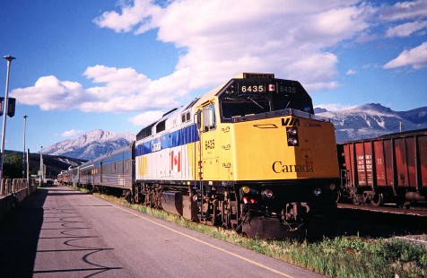 VIA Rail diesel locomotive no. 6435 and passenger train in Jasper, Alberta, Canada, on July 17, 2003. Photograph by Fred M. Springer, © 2014, Center for Railroad Photography and Art. Springer-Canada-NZ(1)-14-04