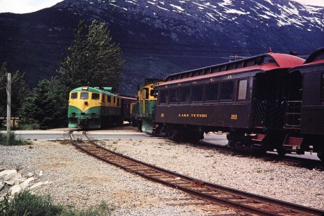 White Pass & Yukon Route diesel locomotives move along the track outside of Creek Shoreline Park in Skagway, Alaska, United States, on June 11, 1998. Photograph by Fred M. Springer, © 2014, Center for Railroad Photography and Art. Springer-Alaska-NZ-05-26