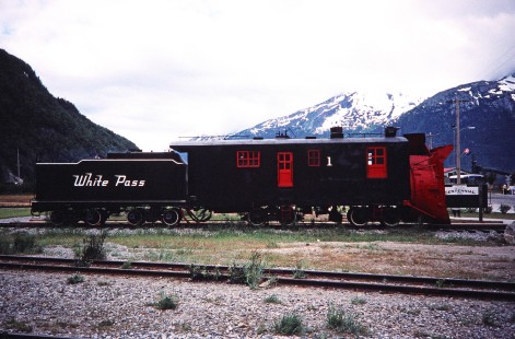 A White Pass & Yukon Route rotary snow plow no. 1  waits on the track in the town of Skagway, Alaska, United States, on June 11, 1998. Photograph by Fred M. Springer, © 2014, Center for Railroad Photography and Art. Springer-Alaska-NZ-04-11