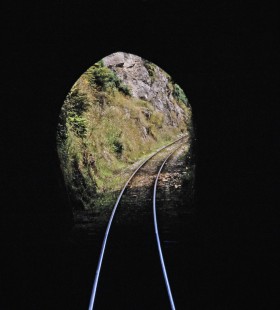 Inside view of Tunnel no. 2 on Taieri Gorge Railway track in Dunedin, Otago, New Zealand, on January 19, 1994. Photograph by Fred M. Springer, © 2014, Center for Railroad Photography and Art. Springer-NZ(1)-15-09