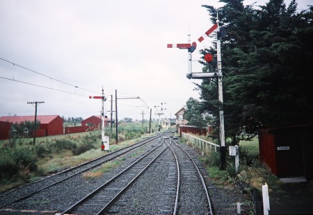 Semaphore signals guard the tracks Ferrymead, Christchurch, New Zealand, on January 15, 1994. Photograph by Fred M. Springer, © 2014, Center for Railroad Photography and Art. Springer-NZ(1)-09-06