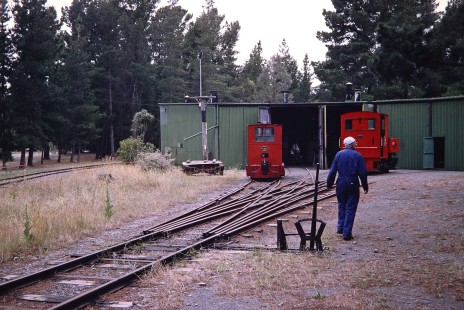 A worker walks past a three-way stub switch at a narrow gauge engine house in Christchurch, Canterbury, New Zealand, on January 10, 2006. Photograph by Fred M. Springer, © 2014, Center for Railroad Photography and Art. Springer-Alaska-NZ-18-09