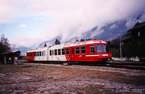Saint-Bernard Express locomotive passes by a cloudy mountain side in Chamonix, France, on October 27, 2000. Photograph by Fred M. Springer, © 2014, Center for Railroad Photography and Art. Springer-Swiss(2)-10-12