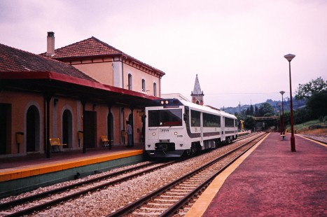 Renfe Feve rail car no. 2406 pulls into the Arridondas station in Arriondas, Cantabria, Spain, on July 10, 2001. Photograph by Fred M. Springer, © 2014, Center for Railroad Photography and Art. Springer-Spain-BNSF-11-37