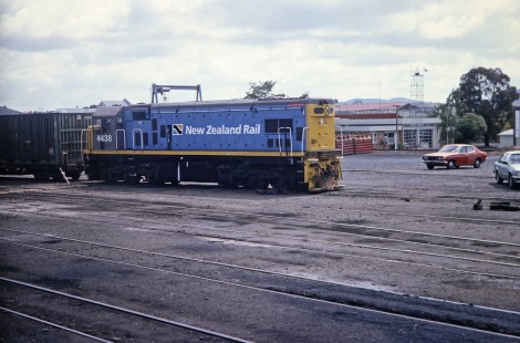 New Zealand Rail diesel locomotive no. 4438 sits near the yard office in Huntly, Auckland/Manawatu-Wanganui, New Zealand, on January 4, 1994. Photograph by Fred M. Springer, © 2014, Center for Railroad Photography and Art. Springer-NZ(1)-01-28