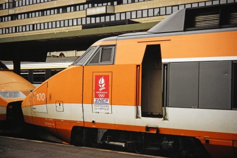 National Society of French Railways TGV electric locomotive no. 100 for the Winter Olympics events in Paris, France, on March 17, 1992. Photograph by Fred M. Springer, © 2014, Center for Railroad Photography and Art. Springer-ZimZam(2)-Swiss-13-07