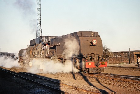 A wide front shot of National Railways of Zimbabwe Garratt steam locomotive no. 737 as it progresses down the track in Bulawayo, Zimbabwe, on August 1, 1991. Photograph by Fred M. Springer, © 2014, Center for Railroad Photography and Art. Springer-Hedjaz-ZimZam(1)-18-37