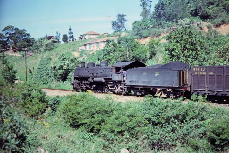 Rede Ferroviária Federal S.A. 2-10-2 steam locomotive no. 201 travels along a hilly track in Roca Grande, Bahia, Brazil, on October 28, 1990. Photograph by Fred M. Springer, © 2014, Center for Railroad Photography and Art. Springer-PA-BR-SOAM-ME-ARG2-04-29