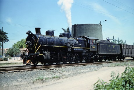 Rede Ferroviária Federal S.A. 2-10-2 steam locomotive no. 209 pulls to a stop at a water tank near Morro Grande, Santa Catarina, Brazil, on October 28, 1990. Photograph by Fred M. Springer, © 2014, Center for Railroad Photography and Art. Springer-PA-BR-SOAM-ME-ARG2-03-08