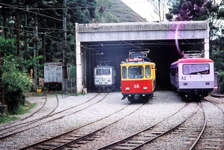 Streetcars A-3, A-2, and A-6 in Campos do Jordao, Sao Paulo, Brazil, on November 2, 1990. Photograph by Fred M. Springer, © 2014, Center for Railroad Photography and Art. Springer-PA-BR-SOAM-ME-ARG2-10-12