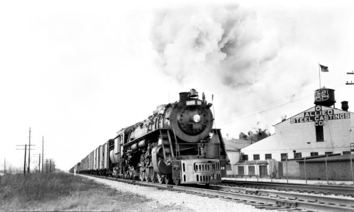 Grand Trunk Western freight train with 4-8-4 steam locomotive #6325 in Harvey, Illinois, in 1953. This locomotive was preserved and now resided at the Age of Steam Roundhouse in Sugarcreek, Ohio. Photograph by Robert A. Hadley. © 2017, Center for Railroad Photography and Art