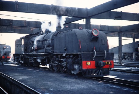 A close-up of National Railways of Zimbabwe Garratt steam locomotive no. 511 in Bulawayo, Zimbabwe, on August 1, 1991. Photograph by Fred M. Springer, © 2014, Center for Railroad Photography and Art. Springer-Hedjaz-ZimZam(1)-17-09