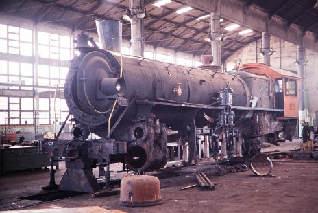 The face of Rede Ferroviária Federal S.A. steam locomotive no. 200 is open as it receives repairs at the Tubarao Shops in Tubarao, Santa Catarina, Brazil, on October 29, 1990. Photograph by Fred M. Springer, © 2014, Center for Railroad Photography and Art. Springer-PA-BR-SOAM-ME-ARG2-05-35