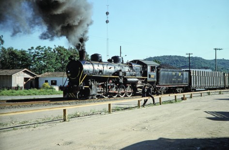 Two young boys run to see Rede Ferroviária Federal S.A. 2-10-2 steam locomotive no. 209 in Jaguaruna, Santa Catarina, Brazil, on October 28, 1990. Photograph by Fred M. Springer, © 2014, Center for Railroad Photography and Art. Springer-PA-BR-SOAM-ME-ARG2-03-37