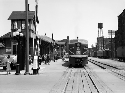 Nickel Plate Railroad PA locomotive #188 leading westbound passenger train #7, the <i>Westerner</i>, at the station in Fort Wayne, Indiana, circa 1950. Crossing tower is visible on left side of image. Photograph by Robert A. Hadley. © 2016, Center for Railroad Photography and Art