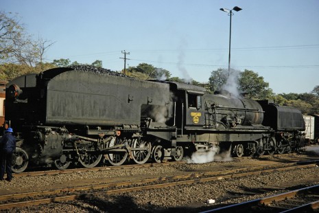 A back angled shot of National Railways of Zimbabwe Garratt steam locomotive no. 386 or "Umyelane" in Livingstone, Southern Province, Zambia on August 8, 1991. Photograph by Fred M. Springer, © 2014, Center for Railroad Photography and Art. Springer-ZimZam(2)-Swiss-19-17