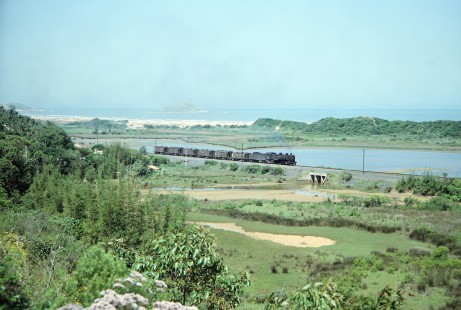 Rede Ferroviária Federal S.A. 2-10-2 steam locomotive no. 207 moves along the South Atlantic coast in Imbituba, Santa Catarina, Brazil, on October 30, 1990. Photograph by Fred M. Springer, © 2014, Center for Railroad Photography and Art. Springer-PA-BR-SOAM-ME-ARG2-06-23