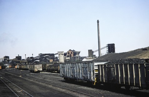 Hopper cars carrying coal at the large mining complex in Hwange, Matabeleland, Zimbabwe, on August 6, 1991. Photograph by Fred M. Springer, © 2014, Center for Railroad Photography and Art. Springer-Hedjaz-ZimZam(1)-24-16