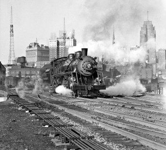 Pere Marquette Railway (PM) train #7, steam locomotive #718, in Detroit, Michigan, circa 1946. Photograph by Robert A. Hadley. © 2016, Center for Railroad Photography and Art
