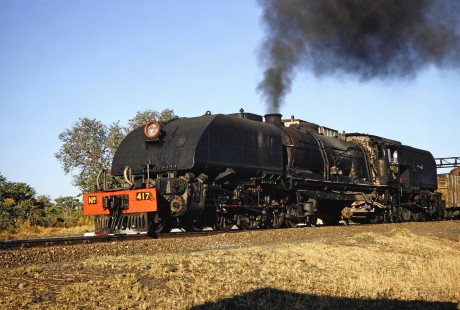 A close-up of National Railways of Zimbabwe Garratt steam locomotive no. 417 in Hwange, Matabeleland, Zimbabwe, on August 5, 1991. Photograph by Fred M. Springer, © 2014, Center for Railroad Photography and Art. Springer-Hedjaz-ZimZam(1)-22-33