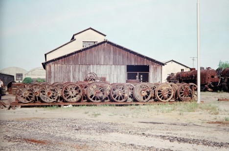 Drive wheels are stacked up at the Tubarao Shops in Tubarao, Santa Catarina, Brazil, on October 29, 1990. Photograph by Fred M. Springer, © 2014, Center for Railroad Photography and Art.-PA-BR-SOAM-ME-ARG2-05-18