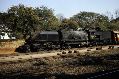 National Railways of Zimbabwe Garratt steam locomotive no. 386 or "Umeylane" at Victoria Falls, Matabeleland North, Zimbabwe, on August 9, 1991. Photograph by Fred M. Springer, © 2014, Center for Railroad Photography and Art. Springer-ZimZam(2)-Swiss-22-27
