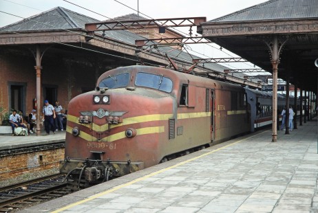 Rede Ferroviária Federal S.A. diesel locomotive no. 9009-61 stops along platform 2 at a station in Jundiai, Santa Catarina, Brazil, on October 31, 1990. Photograph by Fred M. Springer, © 2014, Center for Railroad Photography and Art. Springer-PA-BR-SOAM-ME-ARG2-06-13