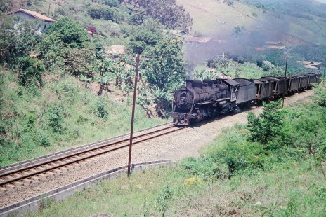Rede Ferroviária Federal S.A. 2-10-2 travels at the base of a hillside in Roca Grande, Rio Grande, Brazil, on October 30, 1990. Photograph by Fred M. Springer, © 2014, Center for Railroad Photography and Art. Springer-PA-BR-SOAM-ME-ARG2-06-31