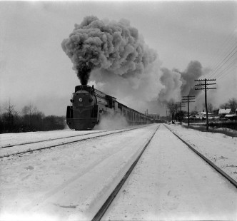 Grand Trunk Western (GTW)  westbound passenger train #19, with steam locomotive #6406 traveling from Detroit to Muskegon, Michigan, circa 1950. Photograph by Robert A. Hadley. © 2016, Center for Railroad Photography and Art.