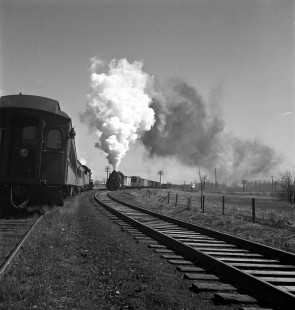 Ann Arbor Railroad train no. 51 meets with freight train at Vernon, Michigan, on March 29, 1941. Photograph by Robert A. Hadley, © 2017, Center for Railroad Photography and Art. Hadley 01-043-05