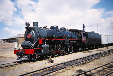Empresa Nacional de Ferrocarriles Bolivia 2-10-2 steam locomotive no. 704 and its crew in Guaqui, Western Bolivia, Bolivia, on September 30, 1992. Photograph by Fred M. Springer, © 2014, Center for Railroad Photography and Art. Springer-ARG-PA-CHI-BO2-12-27