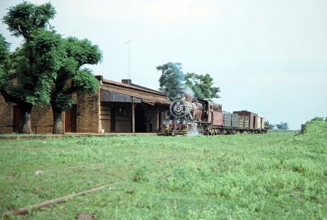 Ferrocarril Presidente Carlos Antonio López (later Ferrocarriles del Paraguay SA FEPASA) steam locomotive no. 151 at the station in Coronel Bogado, Itapúa, Paraguay, on October 23, 1990. Photograph by Fred M. Springer, © 2014, Center for Railroad Photography and Art. Springer-SOAM1-24-10