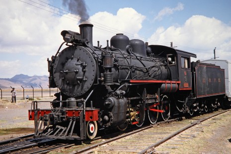 A close-up shot of Empresa Nacional de Ferrocarriles Bolivia 2-8-0 steam locomotive no. 9 or "Mururata" in Guaqui, Western Bolivia, Bolivia, on September 30, 1992. Photograph by Fred M. Springer, © 2014, Center for Railroad Photography and Art. Springer-ARG-PA-CHI-BO2-12-37