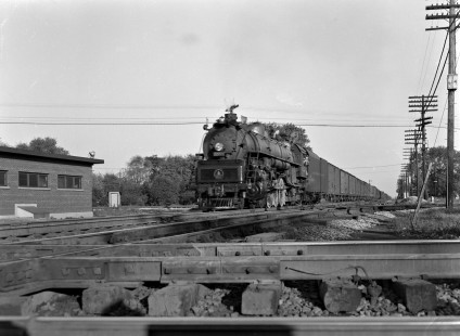 Westbound Baltimore and Ohio Railroad engine no. 5557 at crossing in Fostoria, Ohio. Photograph by Robert A. Hadley, © 2017, Center for Railroad Photography and Art. Hadley-01-005-04