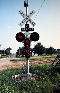 Missouri–Kansas–Texas Railroad crossing signal in Walker, Missouri, on July 14, 1981. Photograph by John F. Bjorklund, © 2016, Center for Railroad Photography and Art. Bjorklund-70-09-01