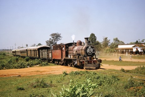 Ferrocarril Presidente Carlos Antonio López (later Ferrocarriles del Paraguay SA FEPASA) steam locomotive no. 59 crosses over a dirt road in rural Paraguay, on October 21, 1991. Photograph by Fred M. Springer, © 2014, Center for Railroad Photography and Art. Springer-ARG-PA-CHI-BO2-04-20