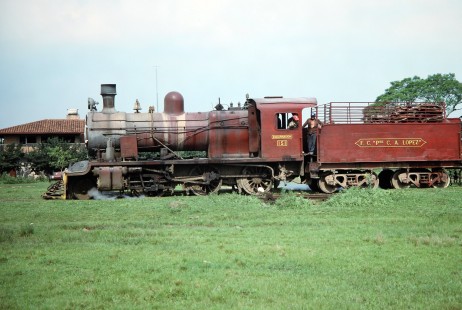 A profile shot of Ferrocarril Presidente Carlos Antonio López (later Ferrocarriles del Paraguay SA FEPASA) steam locomotive no. 151 in Coronel Bogado, Itapúa, Paraguay, on October 23, 1990. Photograph by Fred M. Springer, © 2014, Center for Railroad Photography and Art. Springer-SOAM1-24-10