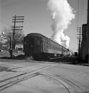 Southbound Ann Arbor Railroad train no. 52 at Ann Arbor, Michigan, with Michigan Wabash Railroad buscar on tail end in 1938. Photograph by Robert A. Hadley, © 2017, Center for Railroad Photography and Art. Hadley 01-046-04