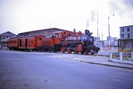 A Guayaquil-Quito Railway steam locomotive no. 11 with  passenger train in Durán, Guayas, Ecuador, on July 22, 1988. Photograph by Fred M. Springer, © 2014, Center for Railroad Photography and Art, Springer-ECU1-01-16