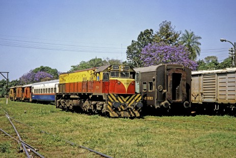 Ferrocarril Provincial de Buenos Aires (Province of Buenos Aires Railway) diesel locomotive no. 7914 and various train cars in Posadas, Misiones, Argentina, on October 20, 1991. Photograph by Fred M. Springer.   © 2014, Center for Railroad Photography and Art, Springer-ARG-PA-CHI-BO2-03-16