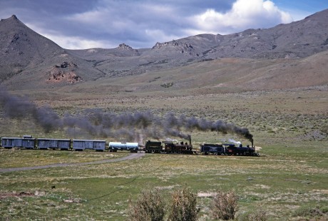 Viejo Expreso Patagónico (Old Patagonian Express) steam locomotives lead a mixed freight and passenger train in Esquel, Chubut, Argentina, on October 30, 1995. Photograph by Fred M. Springer.  © 2014, Center for Railroad Photography and Art, Springer-CHI-ARG1-10-03