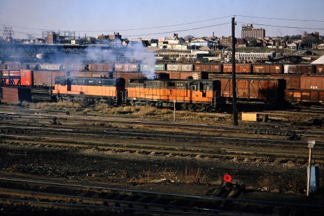 Milwaukee Road Fairbanks-Morse diesel switchers nos. 407 and 415 working in the yard in Milwaukee, Wisconsin, on November 12, 1966. Photograph by Thomas F. McIlwraith, McIlwraith-01-005-19, © 2018, Center for Railroad Photography & Art, <a href="http://www.railphoto-art.org" rel="noreferrer nofollow">www.railphoto-art.org</a>