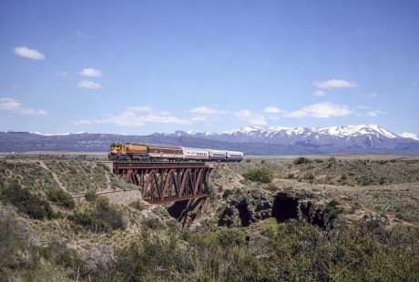 Tren Patagónico (Patagonian Train) diesel locomotive leads passenger train across a bridge at Ñirihuau, Río Negro, Argentina, on October 28, 1995. Photograph by Fred M. Springer.  © 2014, Center for Railroad Photography and Art, Springer-CHI-ARG1-06-07