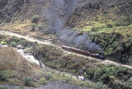 Guayaquil and Quito Railway steam locomotive no. 44 leads  passenger train near Alausi, Chimborazo, Ecuador, on July 31, 1988. Photograph by Fred M. Springer, © 2014, Center for Railroad Photography and Art, Springer-ECU1-17-29