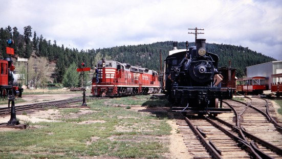 Chicago, Burlington and Quincy Railroad SD9 diesel locomotives nos. 362 and 337 leading a freight train into Hill City, South Dakota, and past Black Hills Central Railroad Climax steam locomotive no. 3 on June 10, 1968. Photograph by Thomas F. McIlwraith, McIlwraith-01-017-07, © 2018, Center for Railroad Photography & Art, <a href="http://www.railphoto-art.org" rel="noreferrer nofollow">www.railphoto-art.org</a>