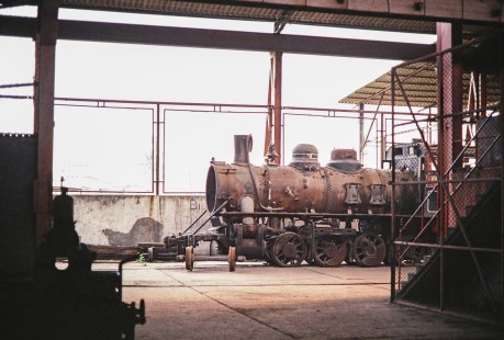 Steam locomotives being repaired at the locomotive repair facility in Durán, Guayas, Ecuador, on July 7, 1990. Photograph by Fred M. Springer, © 2014, Center for Railroad Photography and Art, Springer-ECU1-20-27