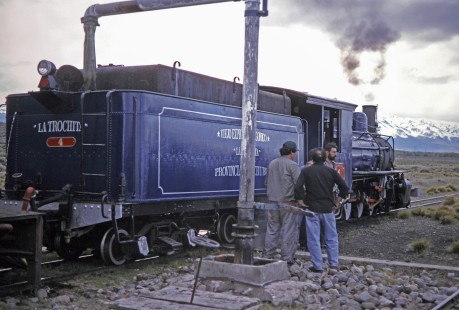 Workers and Viejo Expreso Patagónico (Old Patagonian Express)- also know as "La Trochita," steam locomotive no. 114  in Lepa, Chubut, Argentina, on October 30, 1995. Photograph by Fred M. Springer.  © 2014, Center for Railroad Photography and Art, Springer-CHI-ARG1-11-12