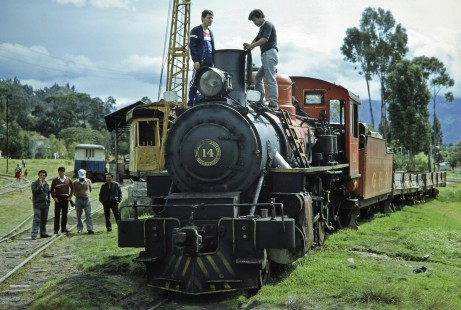 The railroad work crew checks the smokestack of Guayaquil-Quito Railway steam locomotive no. 14 in Cuenca, Azuay, Ecuador, on July 11, 1990. Photograph by Fred M. Springer, © 2014, Center for Railroad Photography and Art, Springer-SOAM1-03-18
